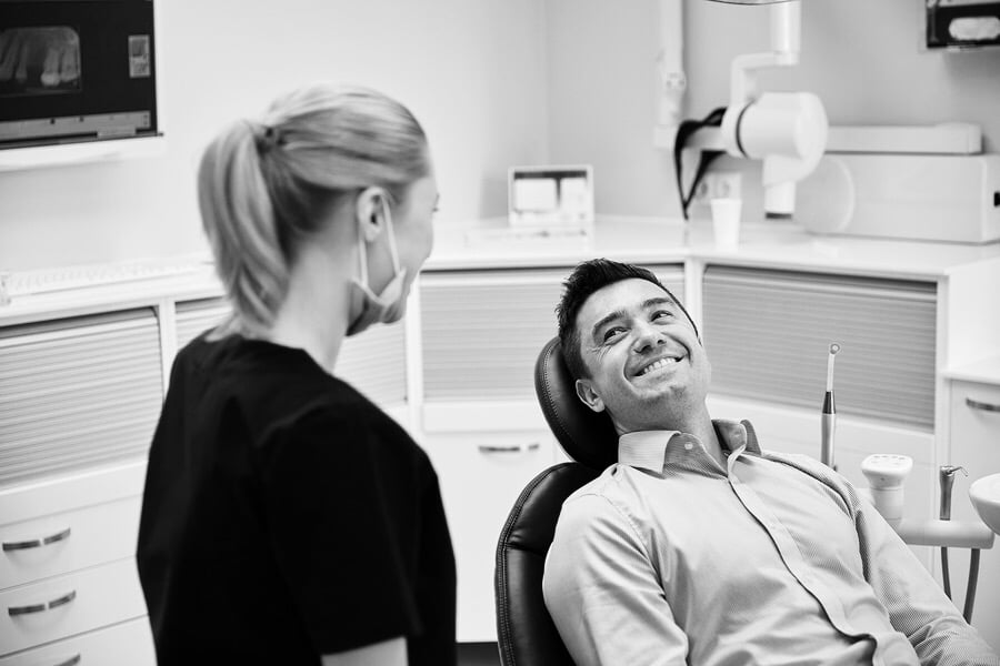 dentist discussing treatment with a patient